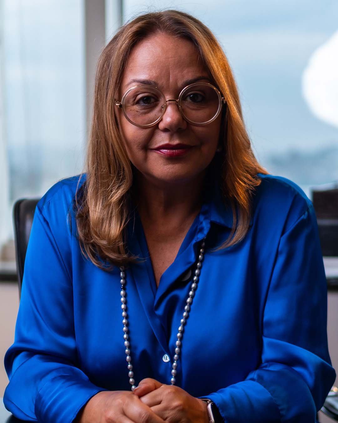 Retrato profissional de Solange Neves, sócia fundadora do escritório SNA Advogados